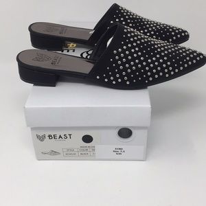 Black Beast slip ons with silver studs.
